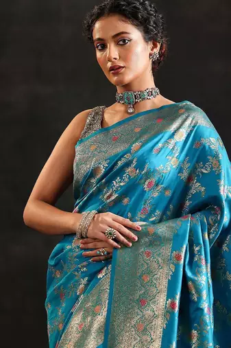 blue woven design saree with unstitched blouse piece