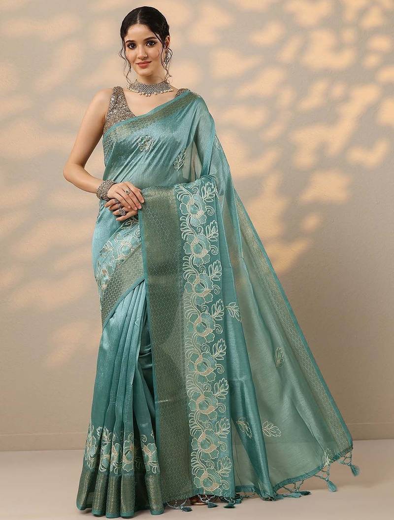 teal embroidered saree with unstitched blouse piece