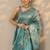 teal embroidered saree with unstitched blouse piece