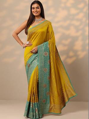 yellow embellished saree with unstitched blouse piece 1