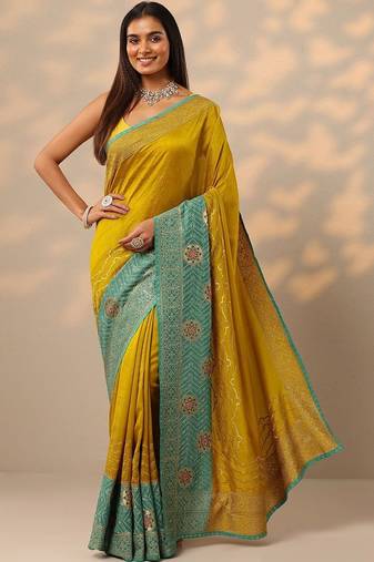 yellow embellished saree with unstitched blouse piece
