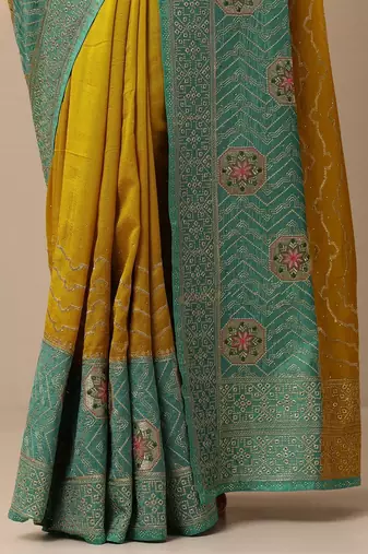 yellow embellished saree with unstitched blouse piece