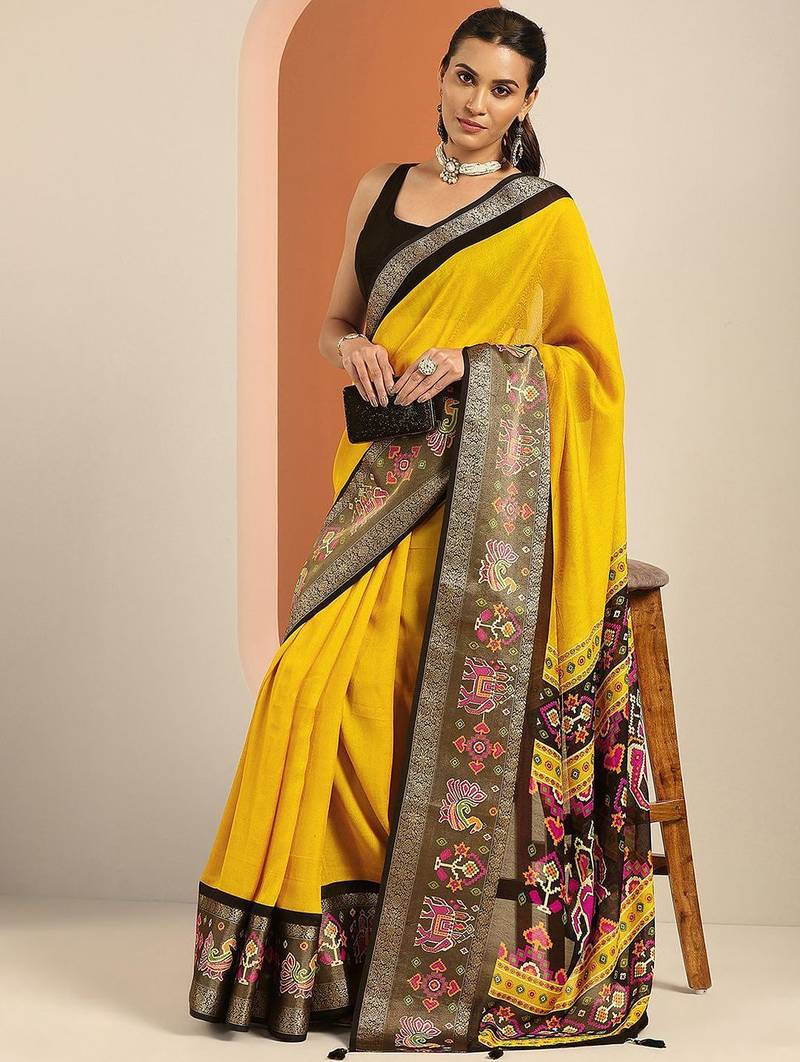 mustard solid georgette saree with unstitched blouse piece