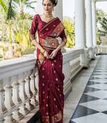 maroon woven design saree with unstitched blouse piece