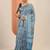 blue printed saree with unstitched blouse piece