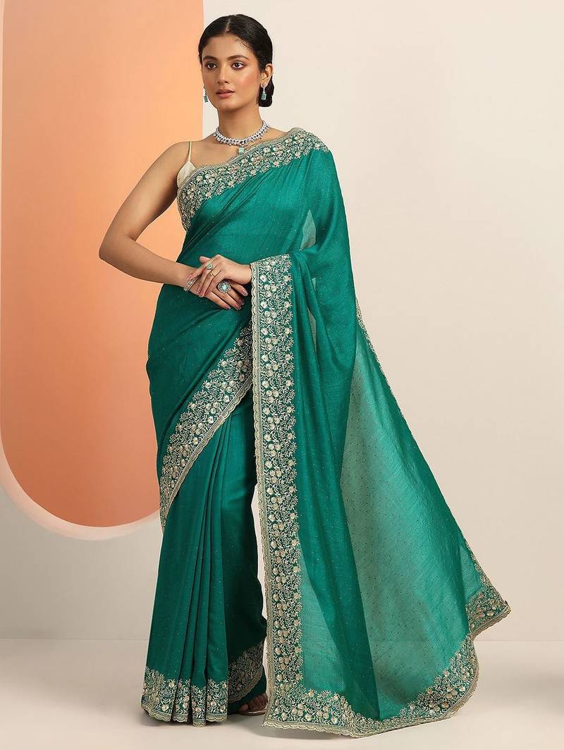 teal embellished saree with unstitched blouse piece