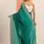 teal embellished saree with unstitched blouse piece