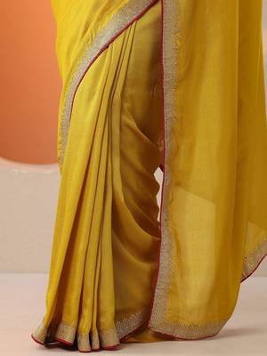 mustard solid saree with unstitched blouse piece 4