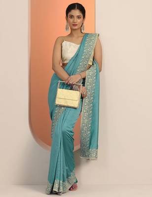 turquoise blue embellished saree with unstitched blouse piece 1