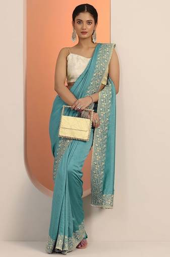 turquoise blue embellished saree with unstitched blouse piece