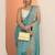 turquoise blue embellished saree with unstitched blouse piece