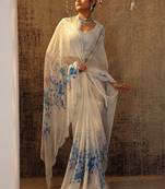 white printed satin saree with unstitched blouse piece