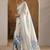 white printed satin saree with unstitched blouse piece