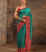 green bandhani embellished saree with unstitched blouse piece