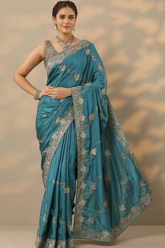 teal embroidered saree with unstitched blouse piece
