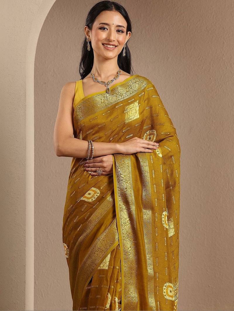mustard woven design saree with unstitched blouse piece