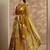 mustard woven design saree with unstitched blouse piece