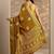 mustard woven design saree with unstitched blouse piece
