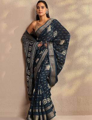 teal woven design saree with unstitched blouse piece 1