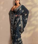 teal woven design saree with unstitched blouse piece
