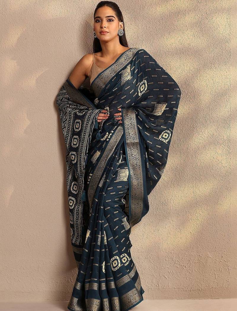 teal woven design saree with unstitched blouse piece