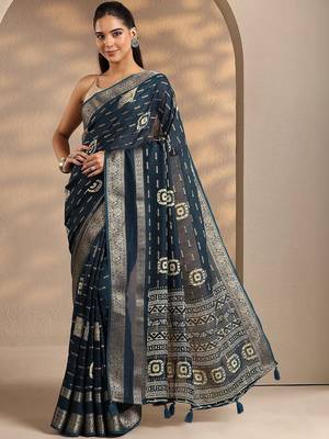 teal woven design saree with unstitched blouse piece 2
