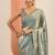 teal solid satin saree with unstitched blouse piece