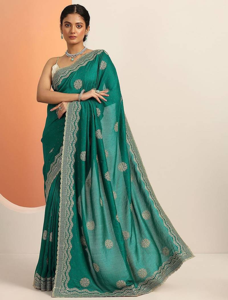 green embellished saree with unstitched blouse piece