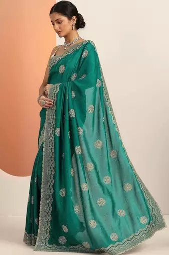 green embellished saree with unstitched blouse piece