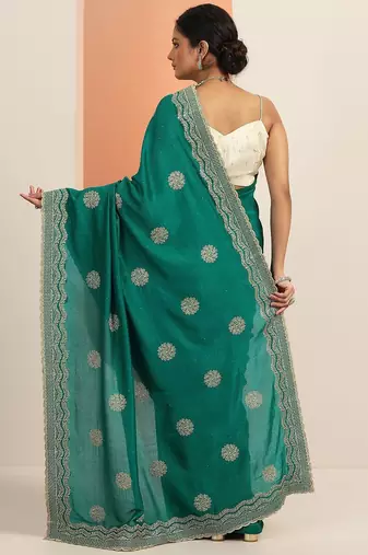 green embellished saree with unstitched blouse piece