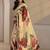 peach floral beads and stones tissue saree