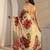 peach floral beads and stones tissue saree