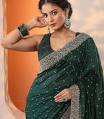 green embellished saree with unstitched blouse piece