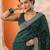 green embellished saree with unstitched blouse piece