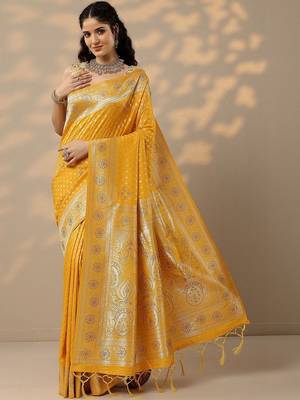 yellow woven design banarsi saree with unstitched blouse piece 1