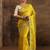 yellow ethnic motifs embellished tissue saree with unstitched blouse piece
