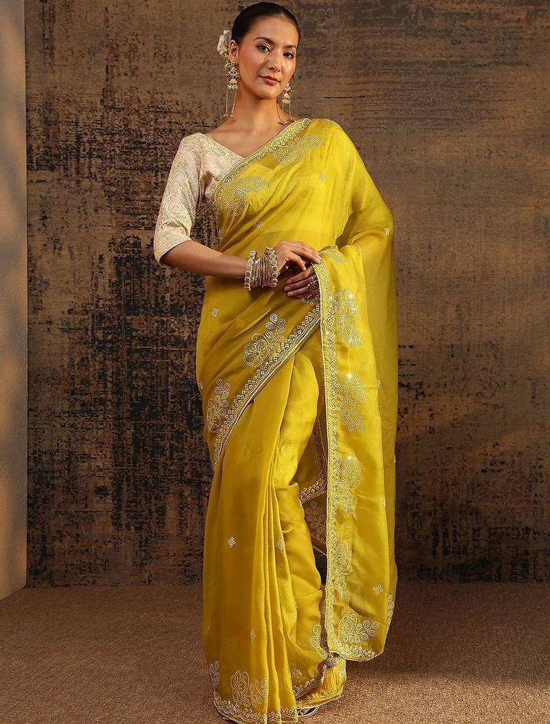 yellow ethnic motifs embellished tissue saree with unstitched blouse piece
