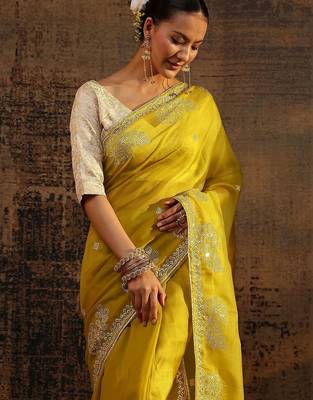 yellow ethnic motifs embellished tissue saree with unstitched blouse piece 2