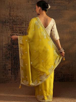 yellow ethnic motifs embellished tissue saree with unstitched blouse piece 3