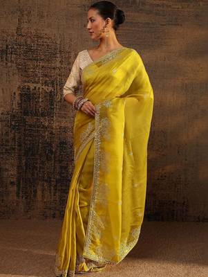 yellow ethnic motifs embellished tissue saree with unstitched blouse piece 4