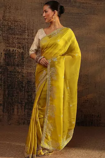 yellow ethnic motifs embellished tissue saree with unstitched blouse piece