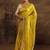 yellow ethnic motifs embellished tissue saree with unstitched blouse piece