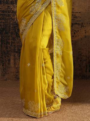 yellow ethnic motifs embellished tissue saree with unstitched blouse piece 5