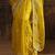 yellow ethnic motifs embellished tissue saree with unstitched blouse piece