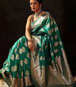green woven design saree with unstitched blouse piece