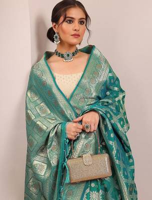teal woven design banarasi silk blend saree with unstitched blouse piece 1