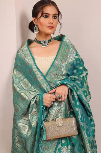 teal woven design banarasi silk blend saree with unstitched blouse piece