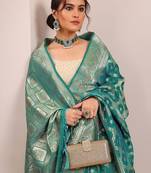 teal woven design banarasi silk blend saree with unstitched blouse piece