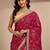 red tribal printed saree with unstitched blouse piece