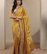 gold solid saree with unstitched blouse piece
